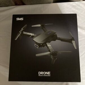 New In Box Black Drone with Obstacle Avoidance